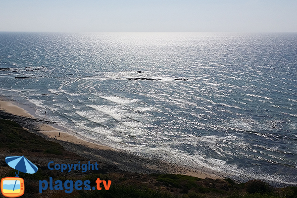 Photo de la plage de Carriagem au Portugal depuis le haut de la falaise